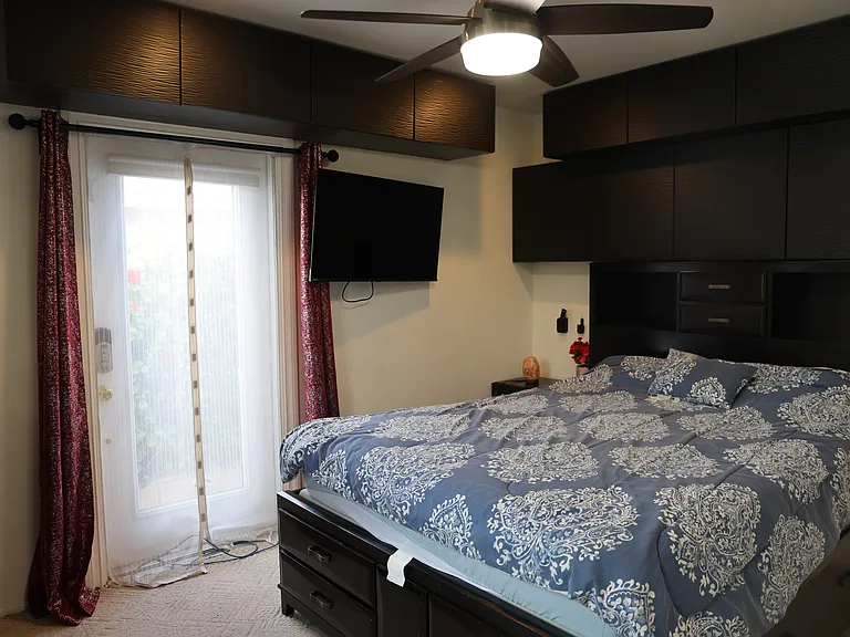 Third bedroom with side yard view