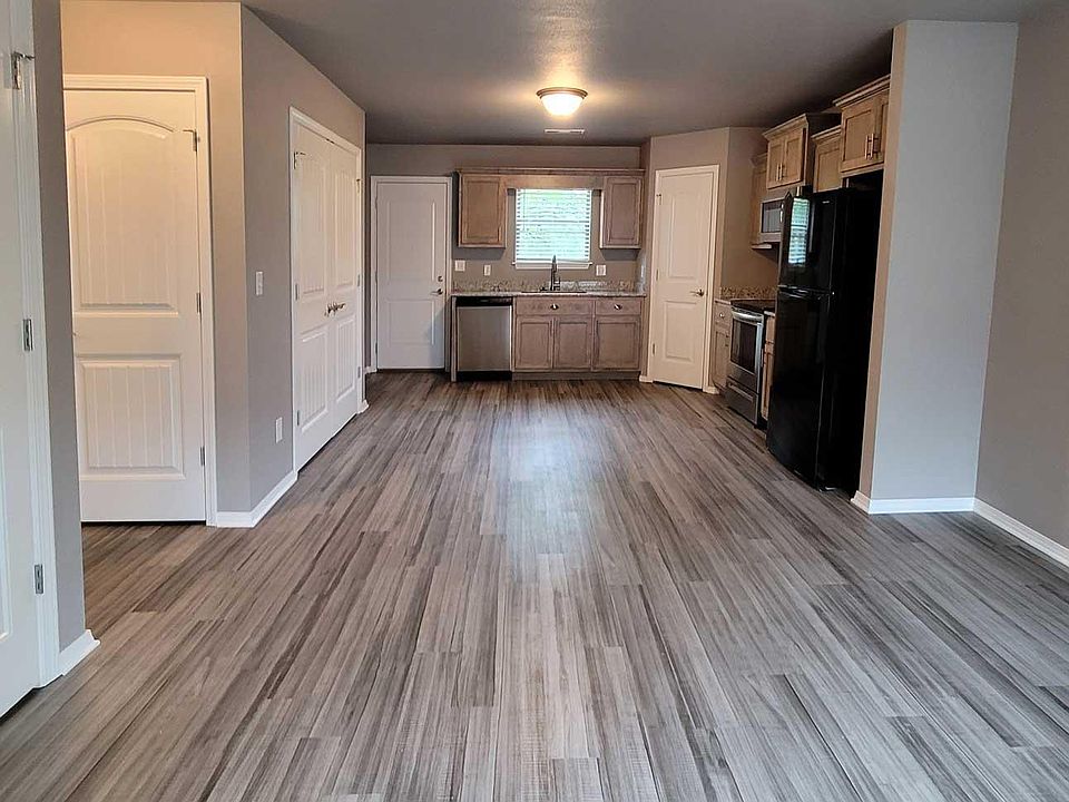 Open floor plan with modern appliances