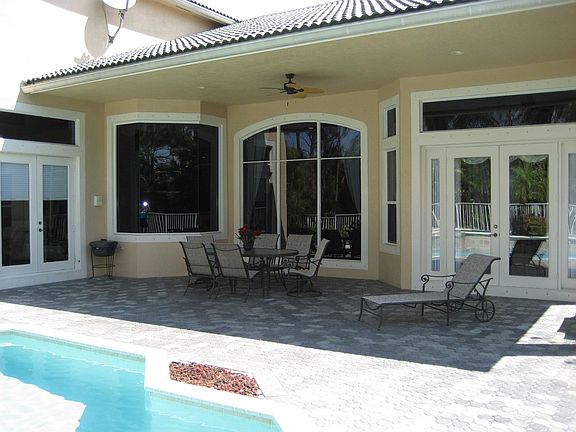 Patio with French Doors to Master & Family Room