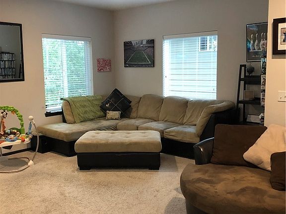 Family room looking into the kitchen and dining room area.  This is a true open floor plan.