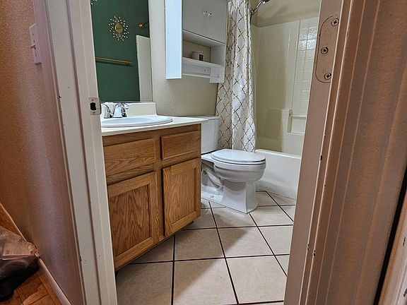 4th image of 7016 Old Village Ave