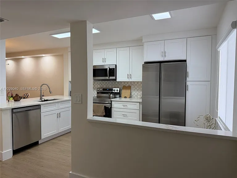 7350 Kinghurst Dr #305 — Photo 20