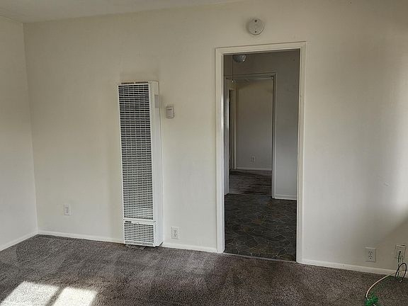 Living Room Looking into Kitchen and Bedroom