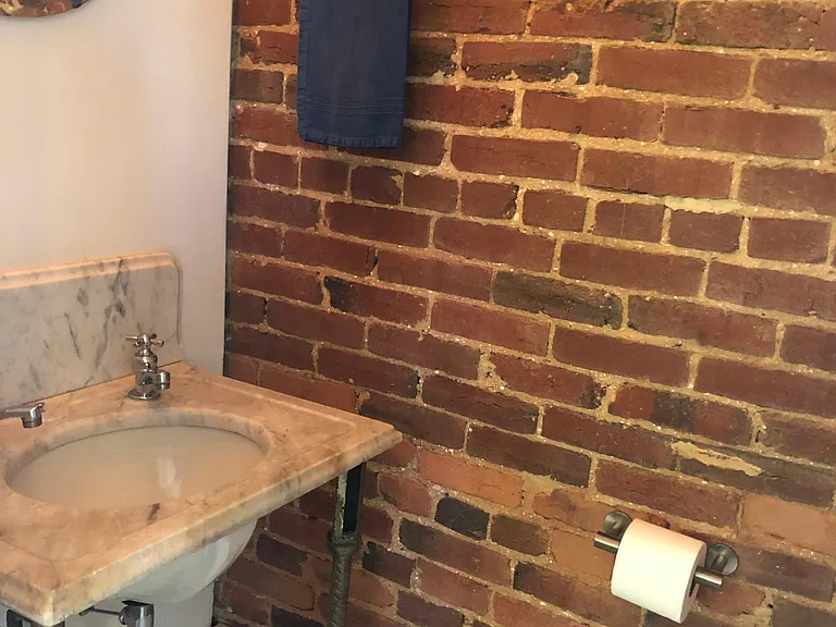 Parlor bathroom with original fittings from Willard Hotel
