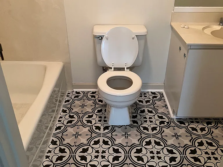 Upstairs bath with new floors and paint