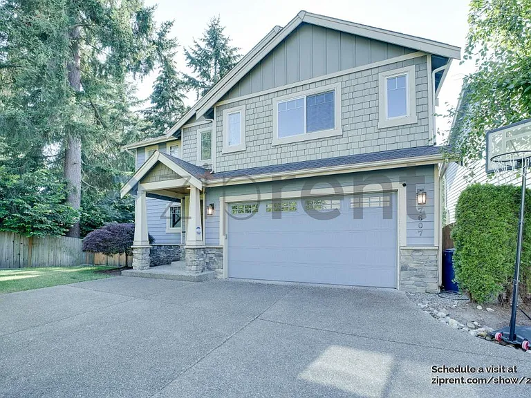 7607 NE 143rd Ct — Photo 1