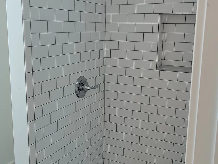 Shower in the bathroom of the NE bedroom