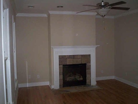 Beautiful stone fireplace in living room.