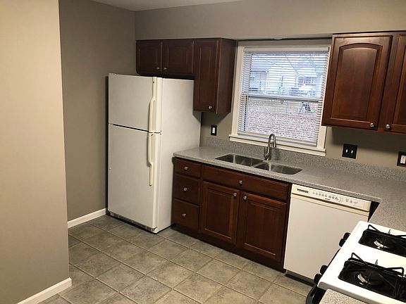 Kitchen with view of backyard