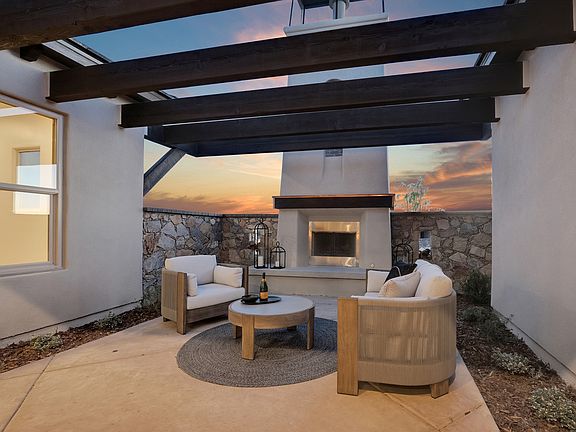 Private Semi-Enclosed Courtyard in this Double Courtyard Design