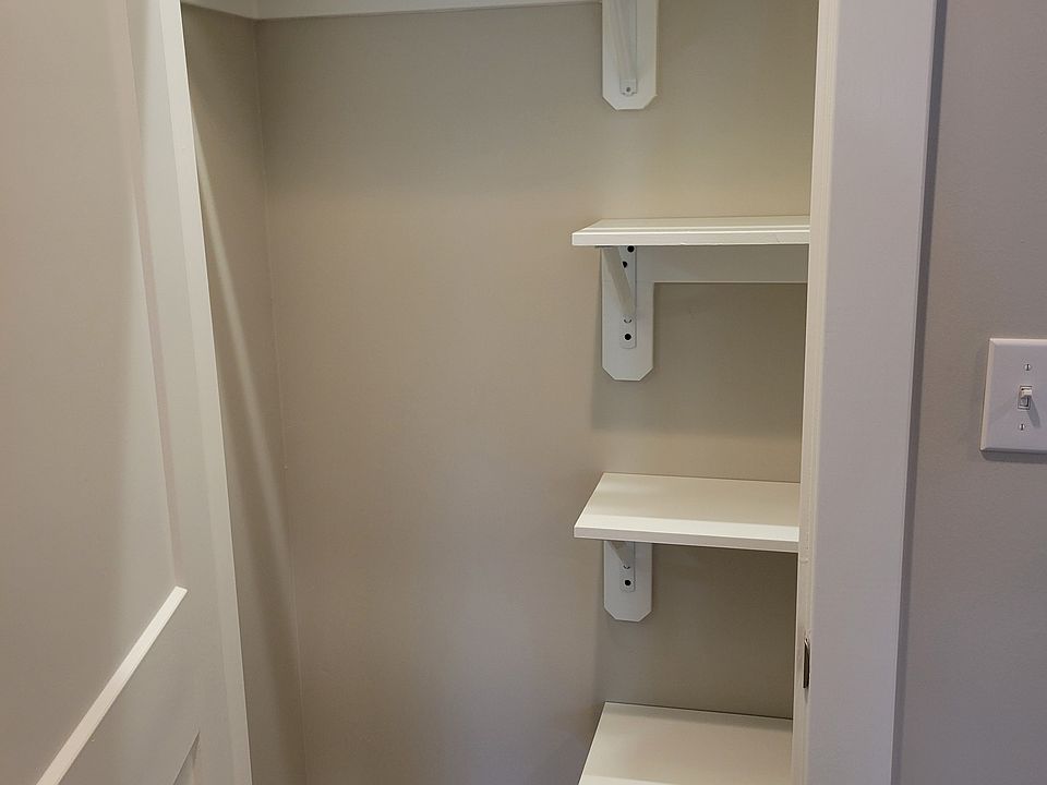 Entry closet with pantry shelves