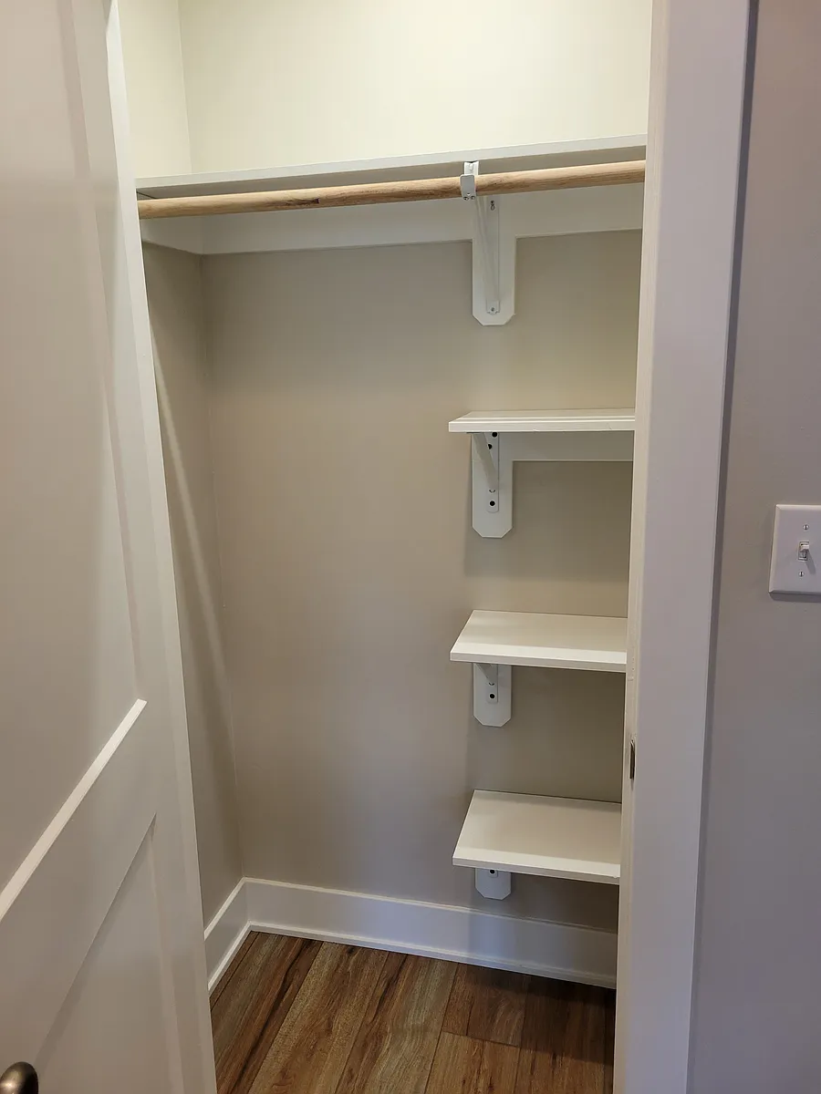 Entry closet with pantry shelves - 4977 W 16th St