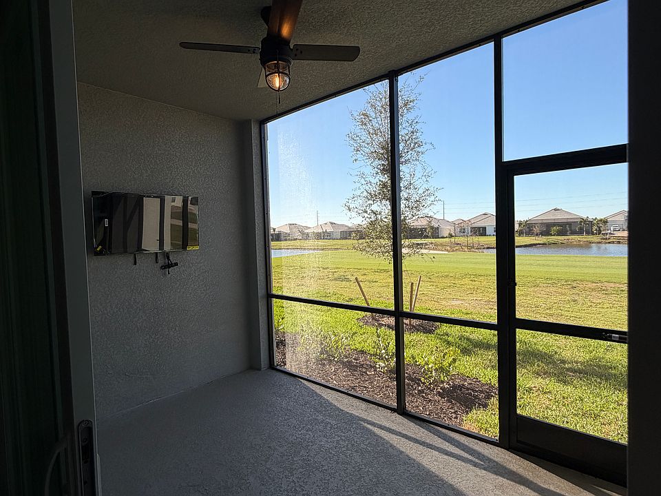Steps from the tee box_Calusa National golf course living at Lakewood Ranch. View from your back Lanai.