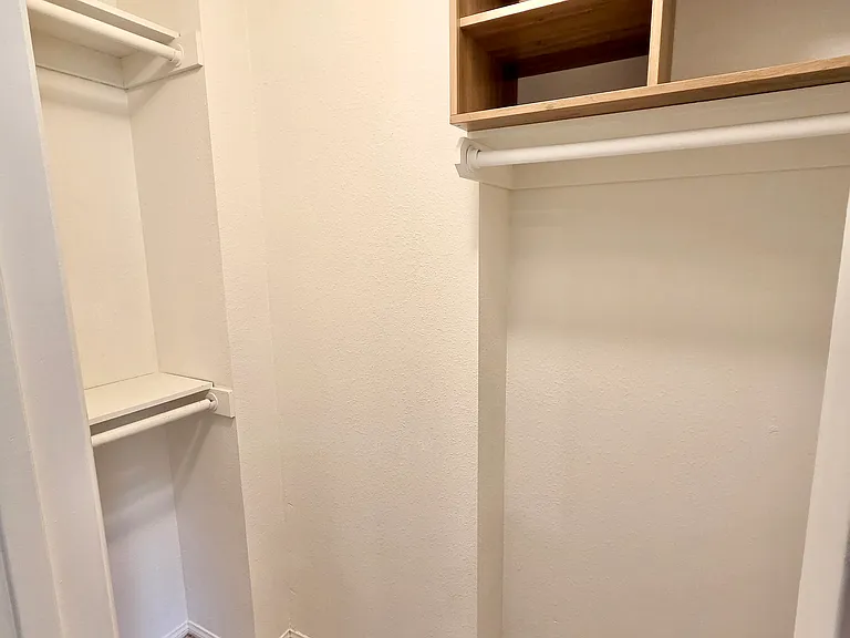 Primary suite walk in closet.