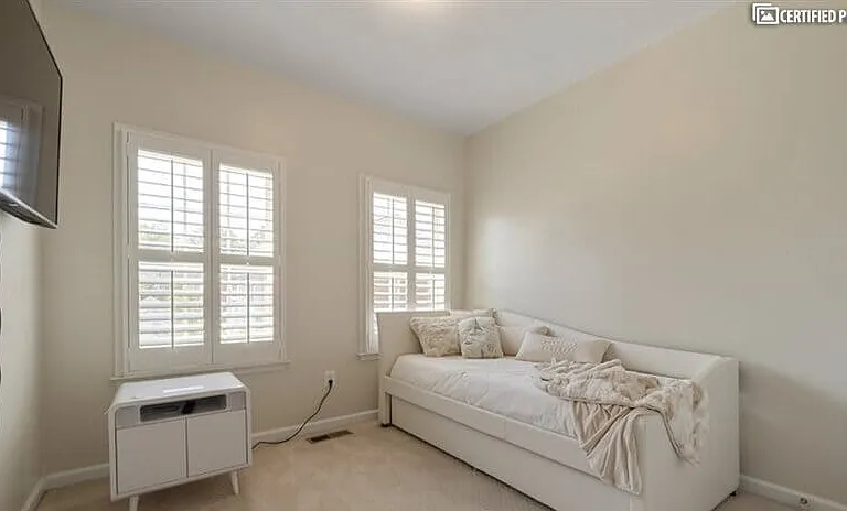 Twin daybed with trundle and Sobro side table.