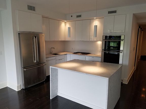 Kitchen with Marble Counter Tops