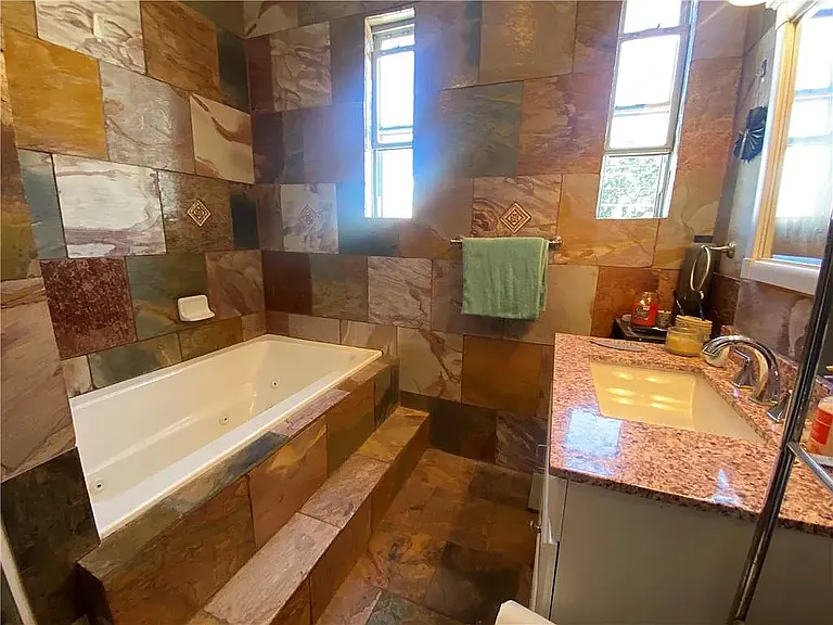 Shared bathroom upstairs from rental room.