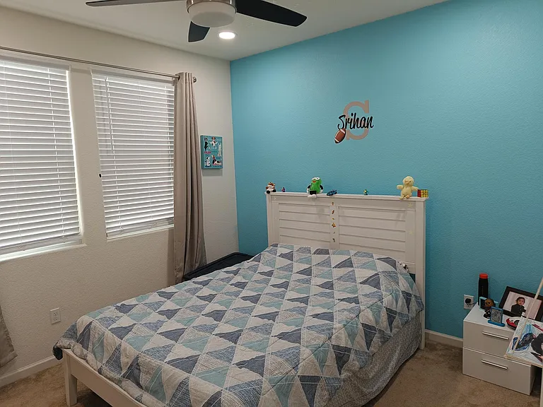 Step into the whimsical world of Bedroom 3, painted with vibrant hues to create a playful haven for kids. Abundant natural light adds a touch of warmth to this charming space. A room designed to spark imagination and create joyful memories. ____
