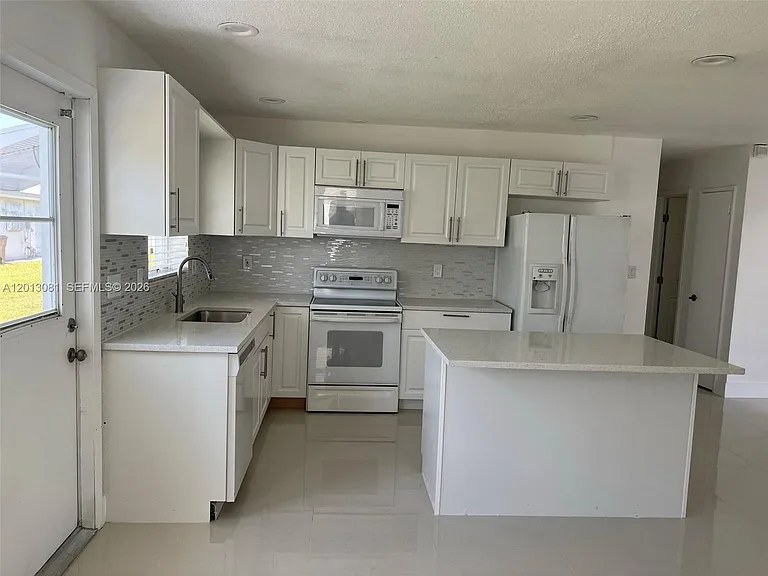 145 NW 41st Ct — Photo 11