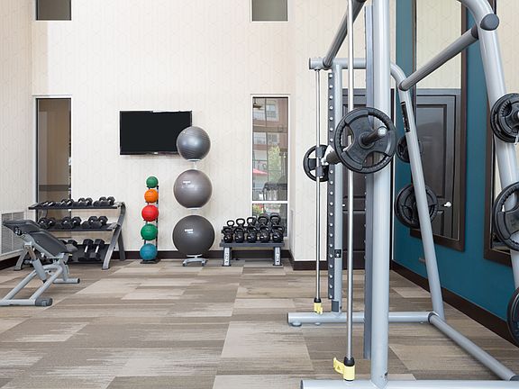 Strength training machines and free weights
