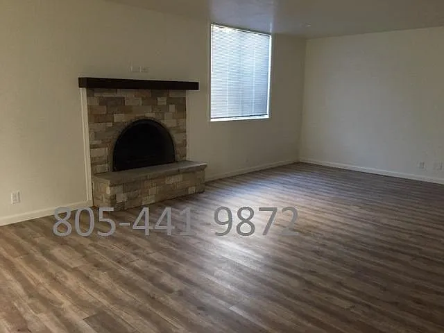 Livingroom with wood burning fireplace