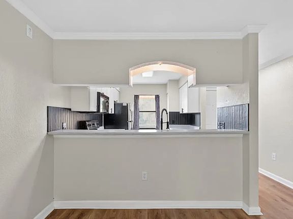 5th image of 10167 Sailwinds Blvd N APT 206
