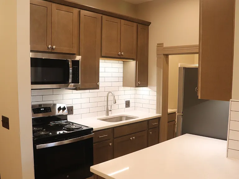 117 W Grand River Ave #202 — Photo 6