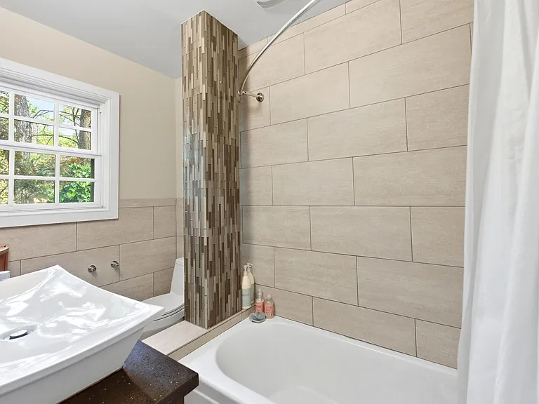 2nd full bathroom with tub upstairs.