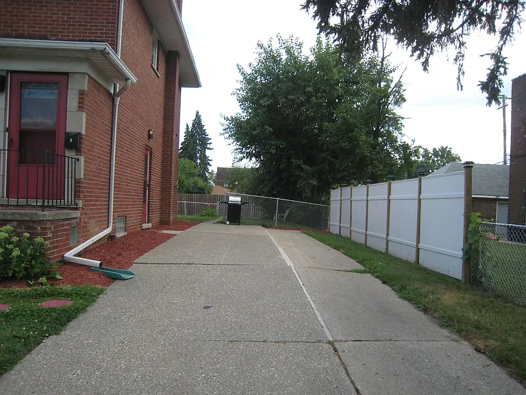 Driveway and side of the duplex...
