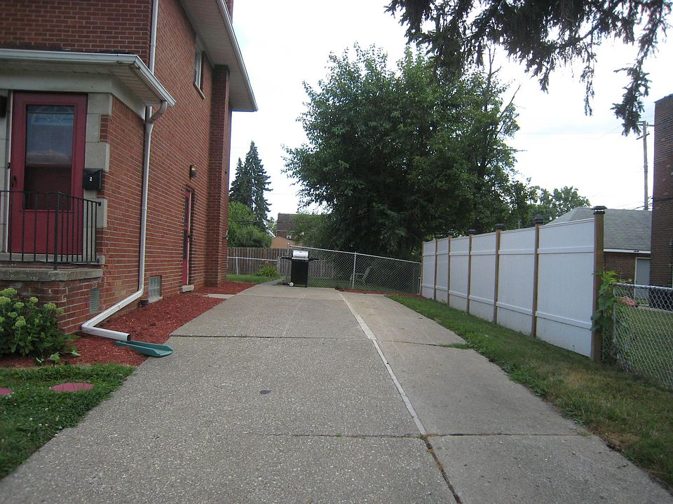Driveway and side of the duplex...