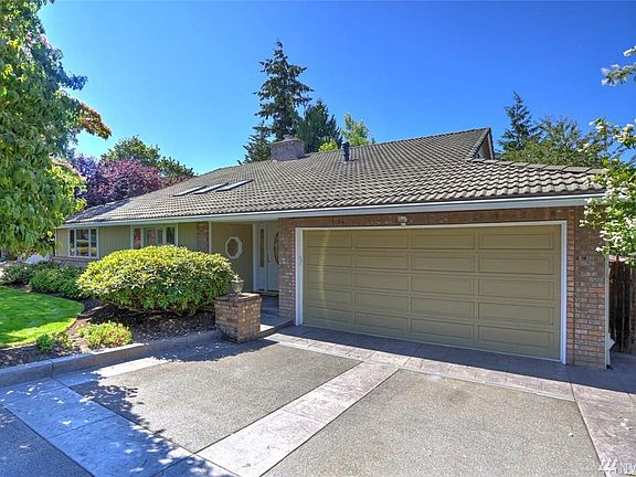 Enjoy features such as the lifetime tile roof and stamped concrete driveway accents. 