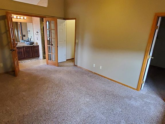 Huge Master Bedroom with large walk-in closet. Windows with mountain views