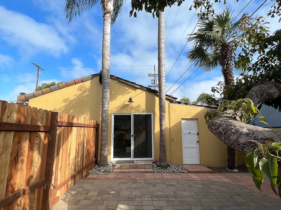 Backyard looking to house (sliding door)