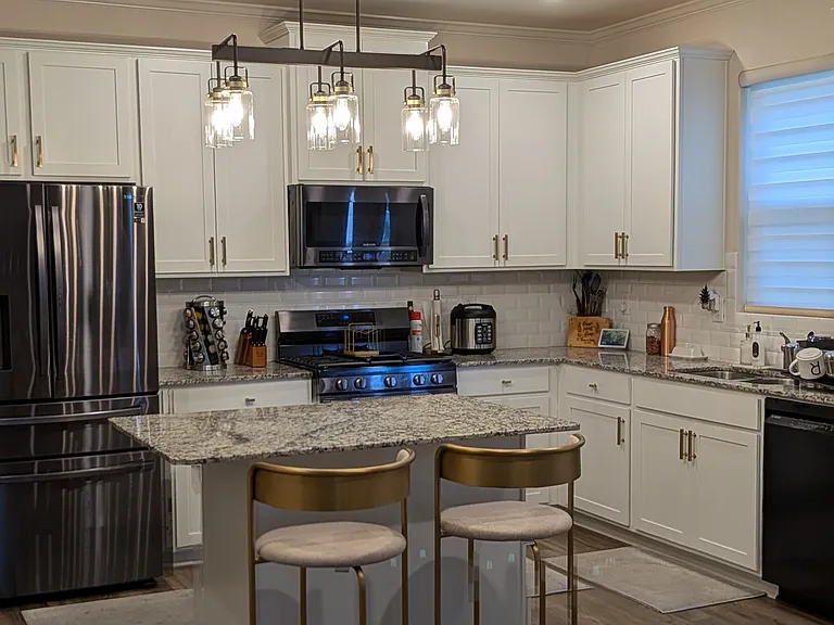 Kitchen with Island and Counter Stools