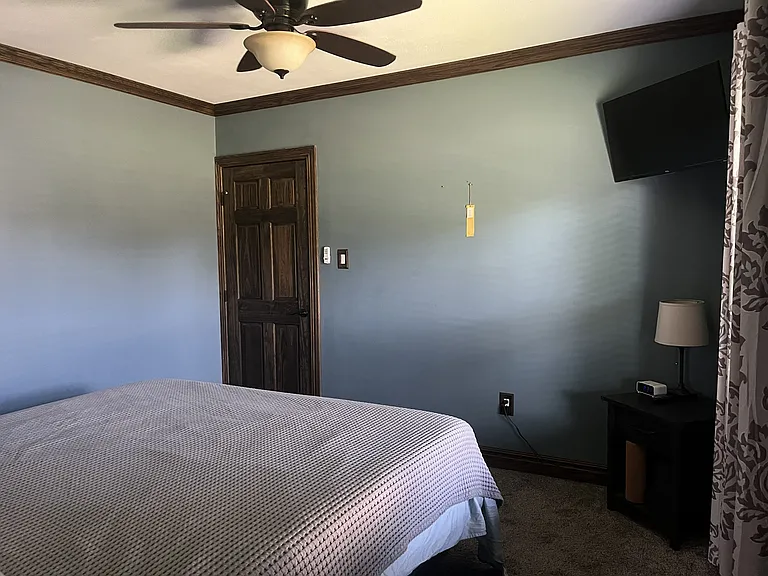 Bedroom view 2. King-sized bed pictured (not included)