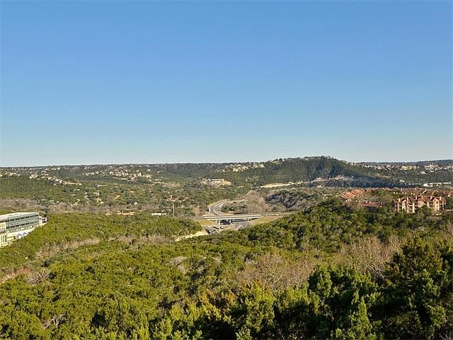 Panoramic views of Cat Mountain from the family room, game room, breakfast room, master bedroom, and two secondary bedrooms.