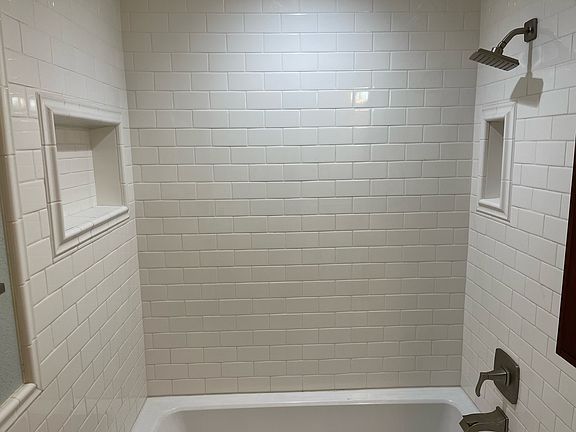 updated bathroom with insets and high end fixtures