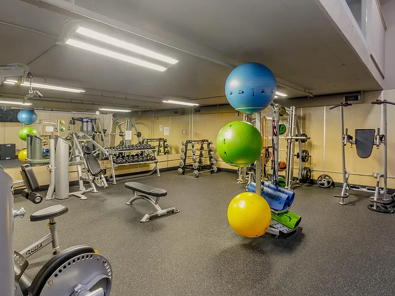 1st floor of two story gym with yoga/weight room