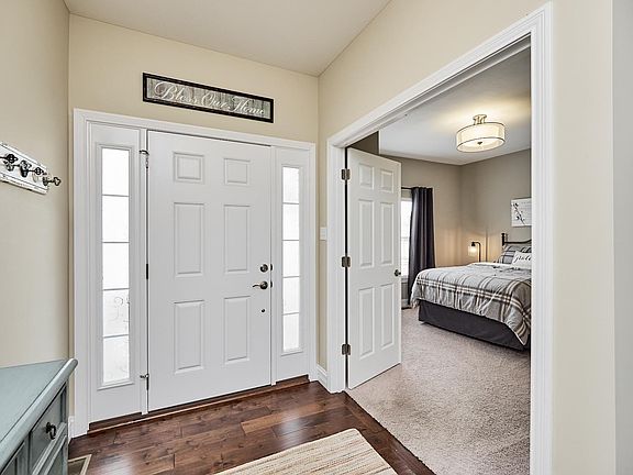 French doors open to a 2nd bedroom.