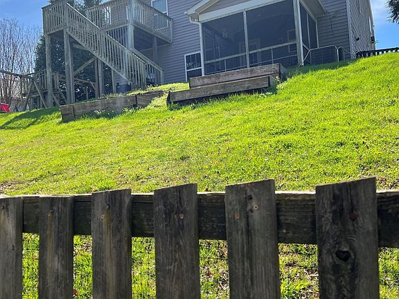 upper level deck, kid play set, screen porch, patio