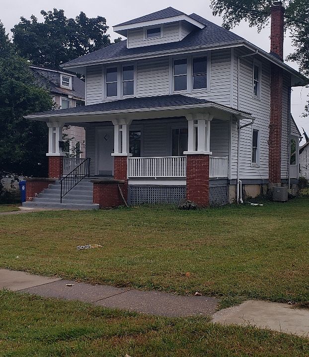 front of house, showing large front porch