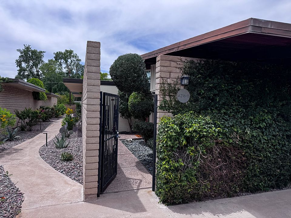 Unit entrance of the beautifully landscaped main path.