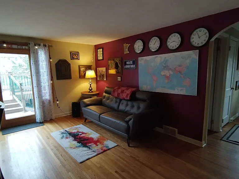 Living room with dining area with a walkout deck