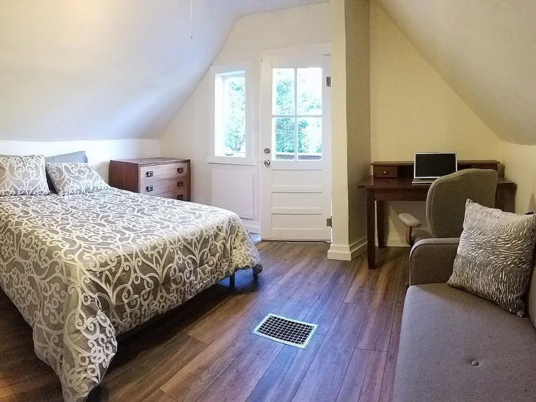 Upper level bedroom, east view. Queen size bed.