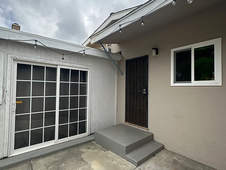 Back patio, door into kitchen.