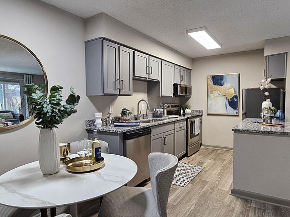 Kitchen with granite counters and modern cabinetry