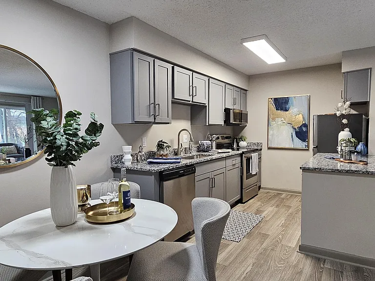 Kitchen with granite counters and modern cabinetry