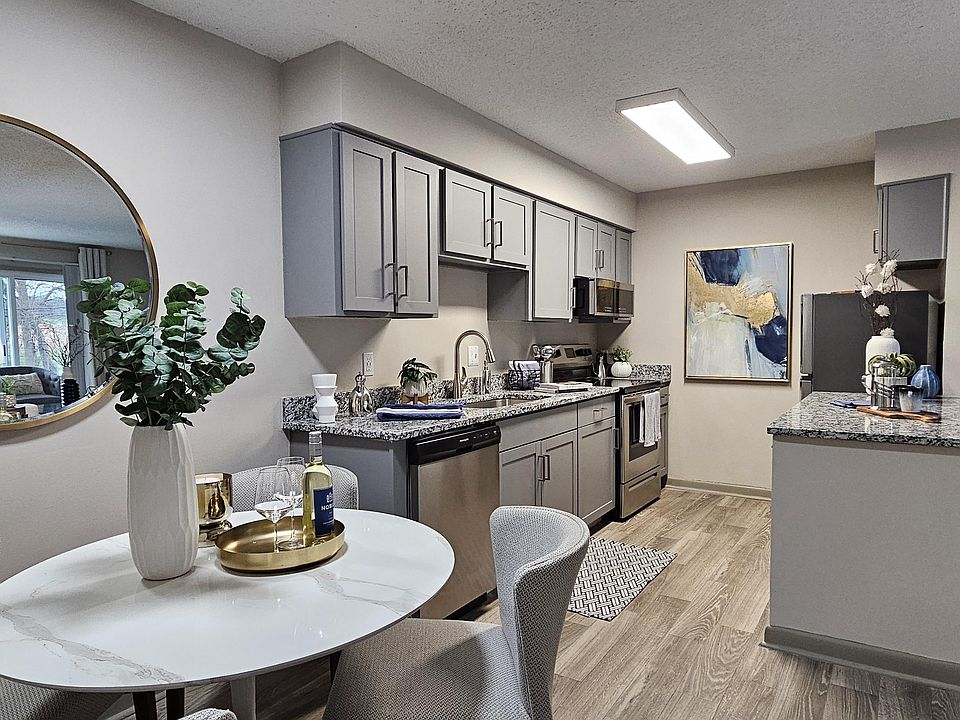 Kitchen with granite counters and modern cabinetry