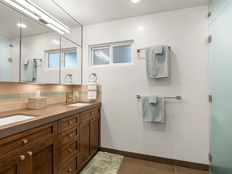 Double sinks and nice large mirror.