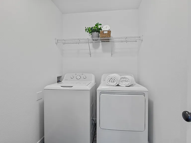 Separated laundry room.